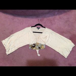 Bebe sexy loose sleeved crop top . Ties back